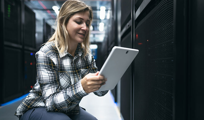 female-data-center-technician-working-inside-serve-2022-01-31-18-01-57-utc